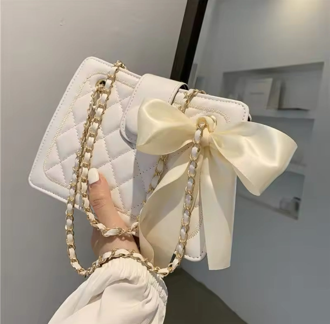 Cartera rígida Sade